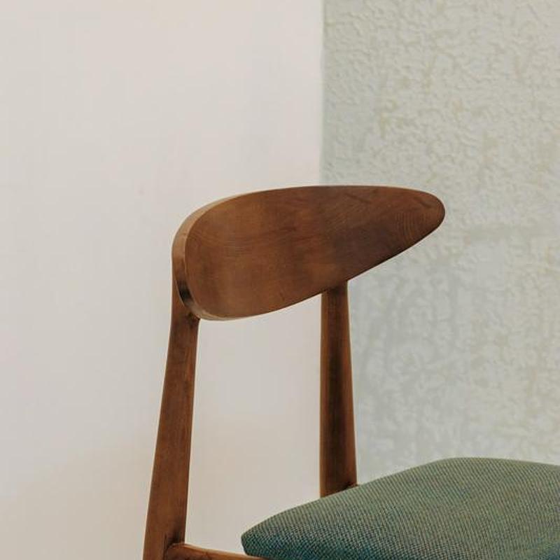 Three-legged stool in maple